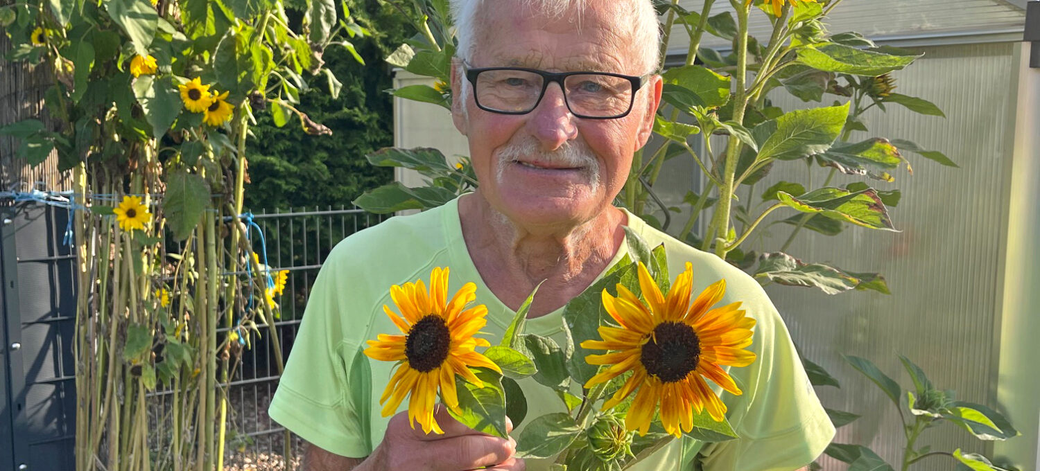 Fritz Wulf liebt seine familie und den Garten. In diesem Jahr ist er besonders stolz auf seine vier Meter hohen Sonnenblumen.